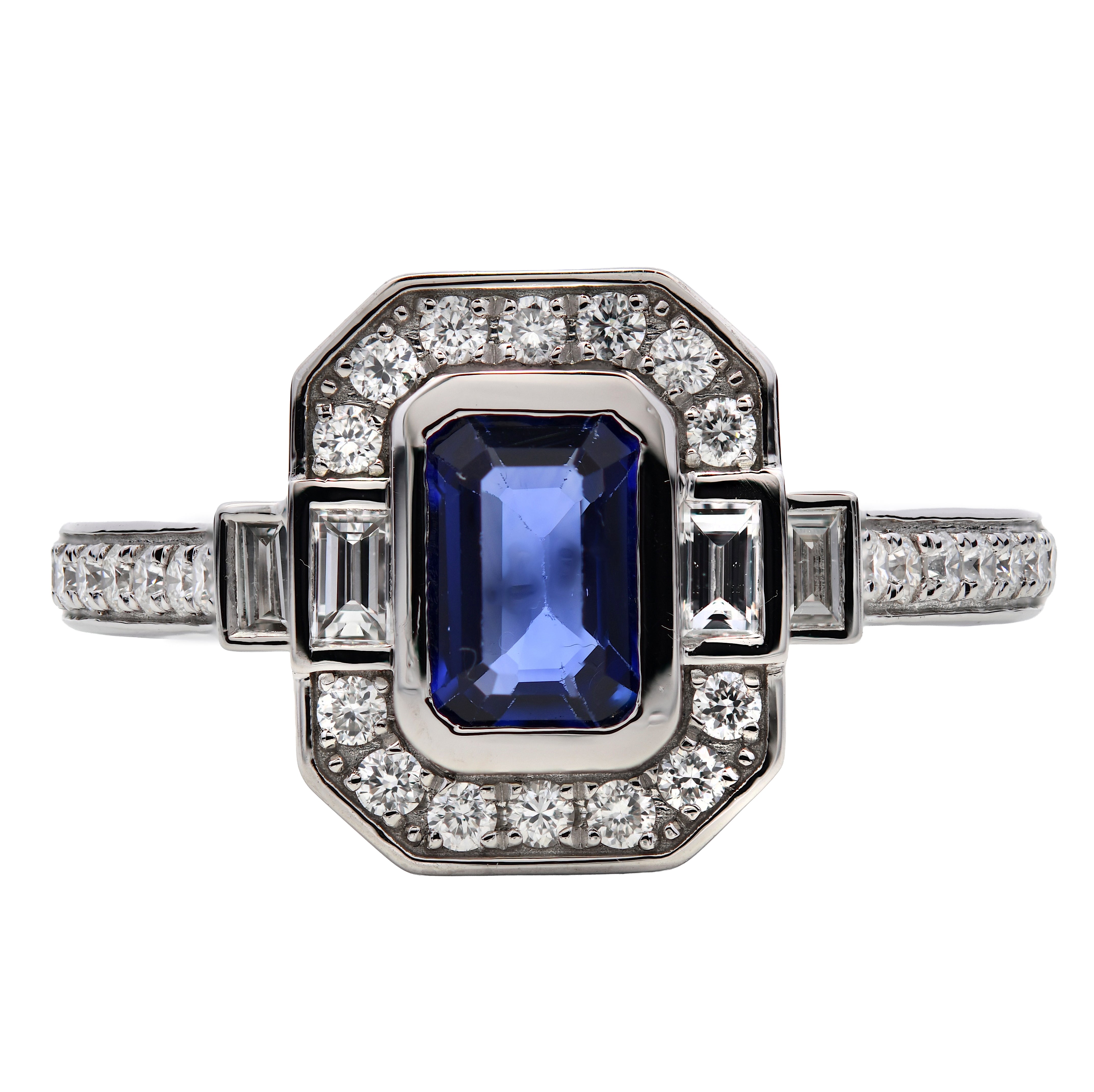 Blue Sapphire 0.61ct & Diamond 0.42ct Halo Ring in Platinum